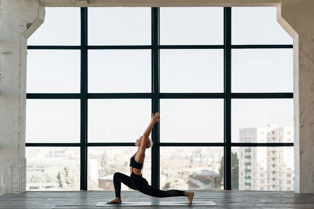 Woman practicing yoga on a mat