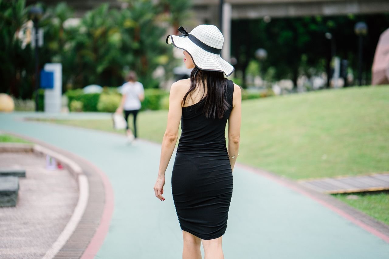 Woman walking outdoors for daily movement during menopause